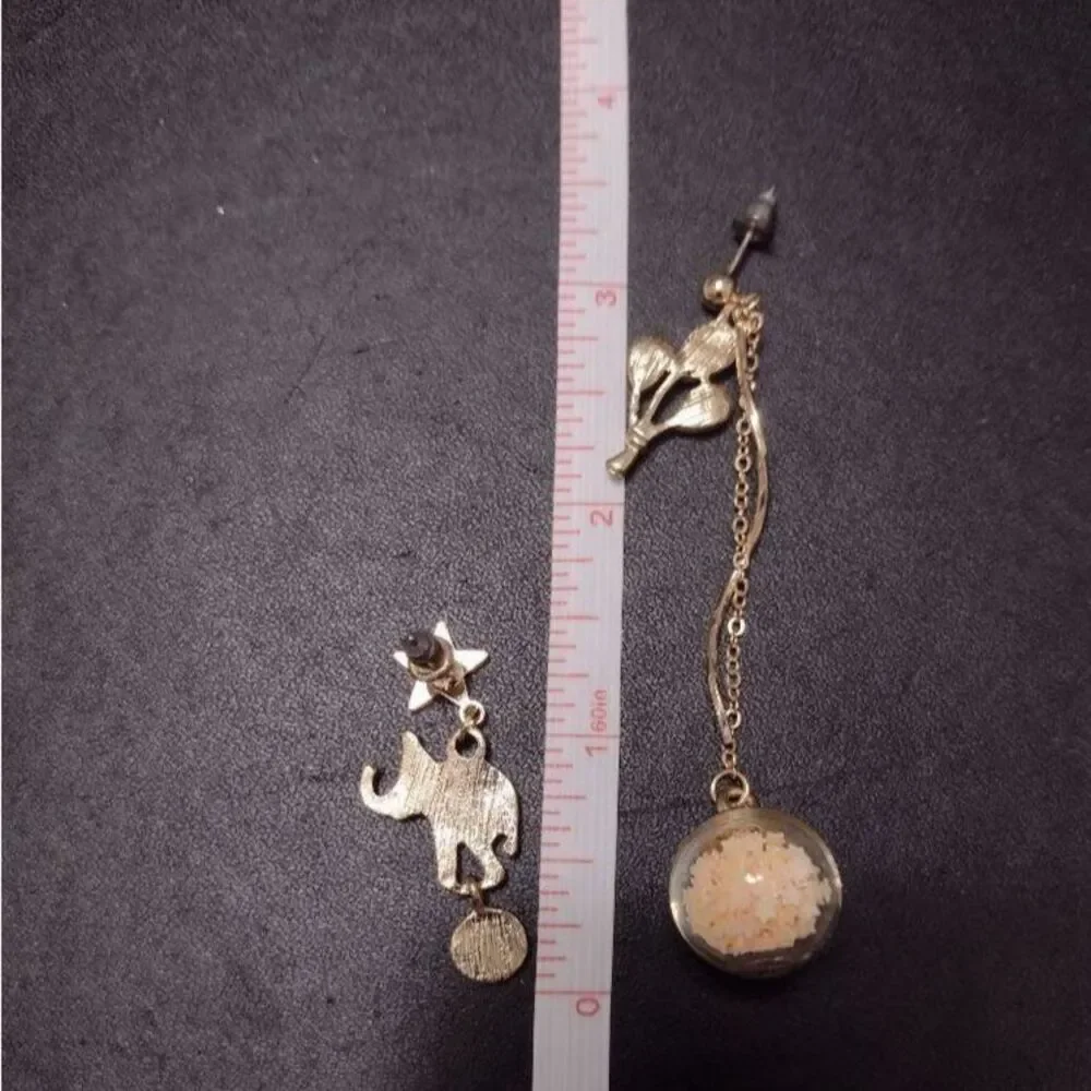 Circus high low earrings
